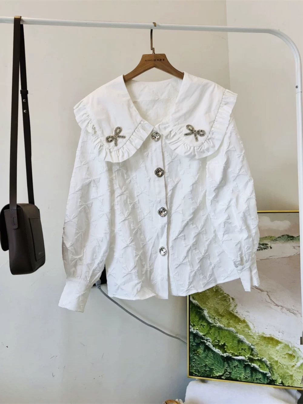 Ivory Textured Jacquard Blouse with Oversized Ruffle Collar & Crystal Bow
